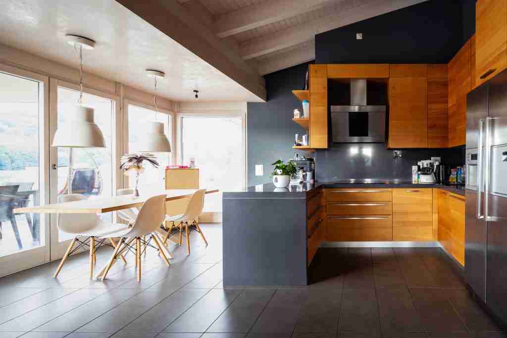 Front view modern wooden kitchen with table and chair Condo Kitchen Renovations in Toronto - 9