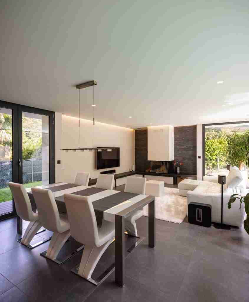 Modern living room overlooking the garden and swimming pool. Condo Renovation Project Management in Toronto - 6