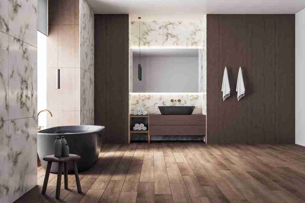 Luxury bathroom with bathtub and self care products. Condo Bathroom Renovations in Toronto - 5