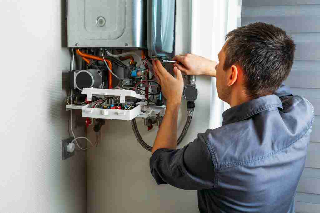 Plumber attaches Trying To Fix the Problem with the Residential Condo Lighting and Electrical Services in Toronto - 8