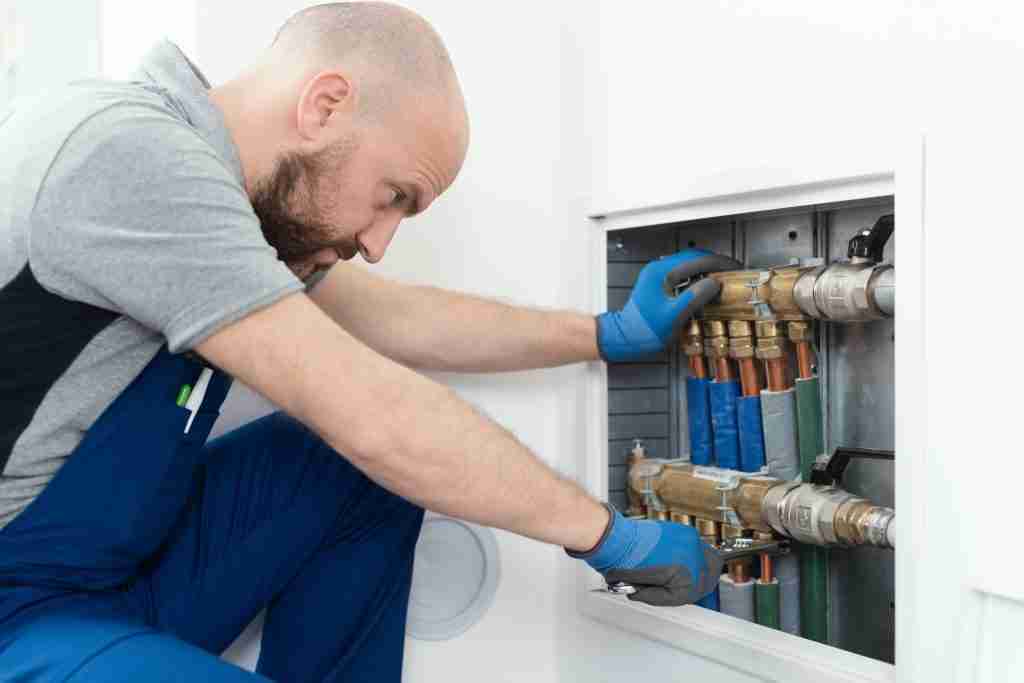 Professional plumber installing plumbing manifolds Condo Plumbing Services in Toronto - 8