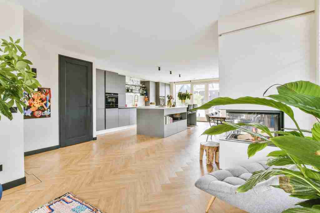Spacious modern room with lounge and dining areas Condo Flooring and Tiling in Toronto - 12