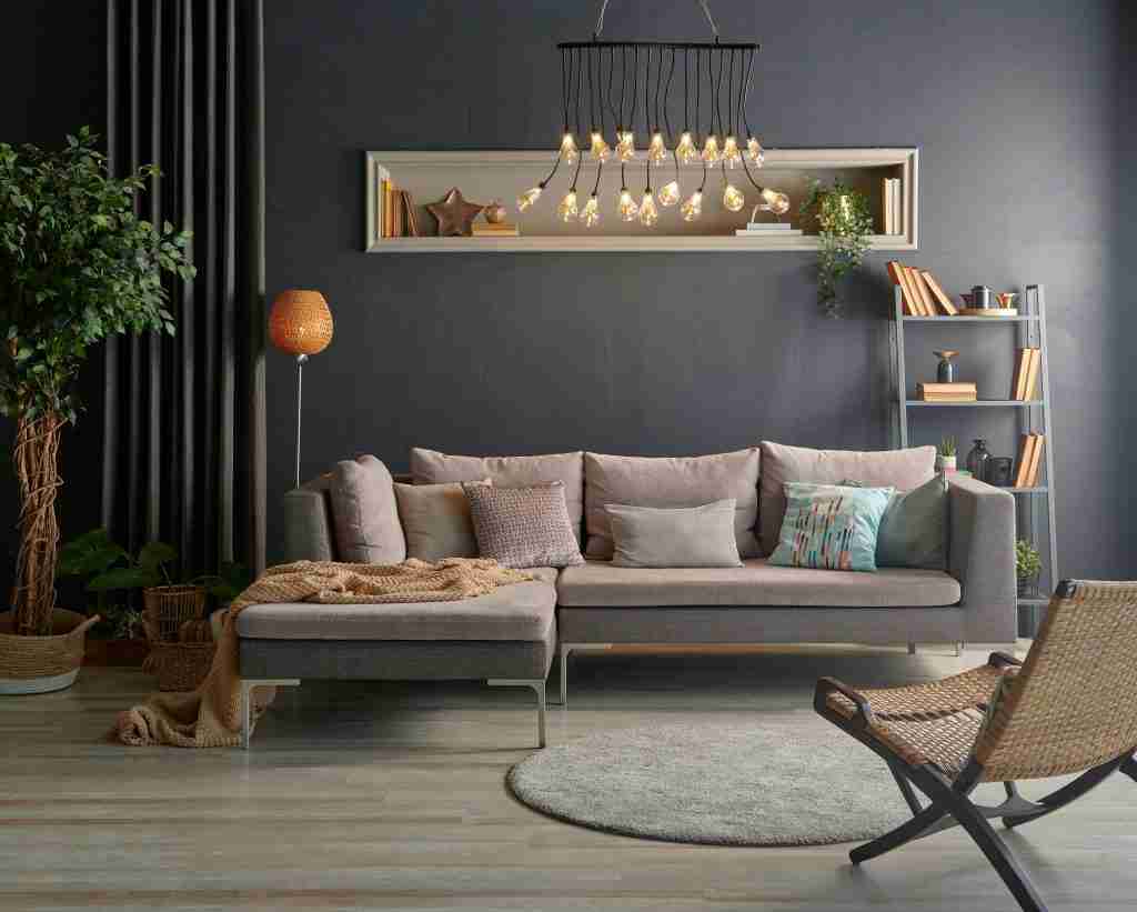 Grey stone wall and modern sofa interior room style. Decorative Condo Renovation Company in Brampton - 7