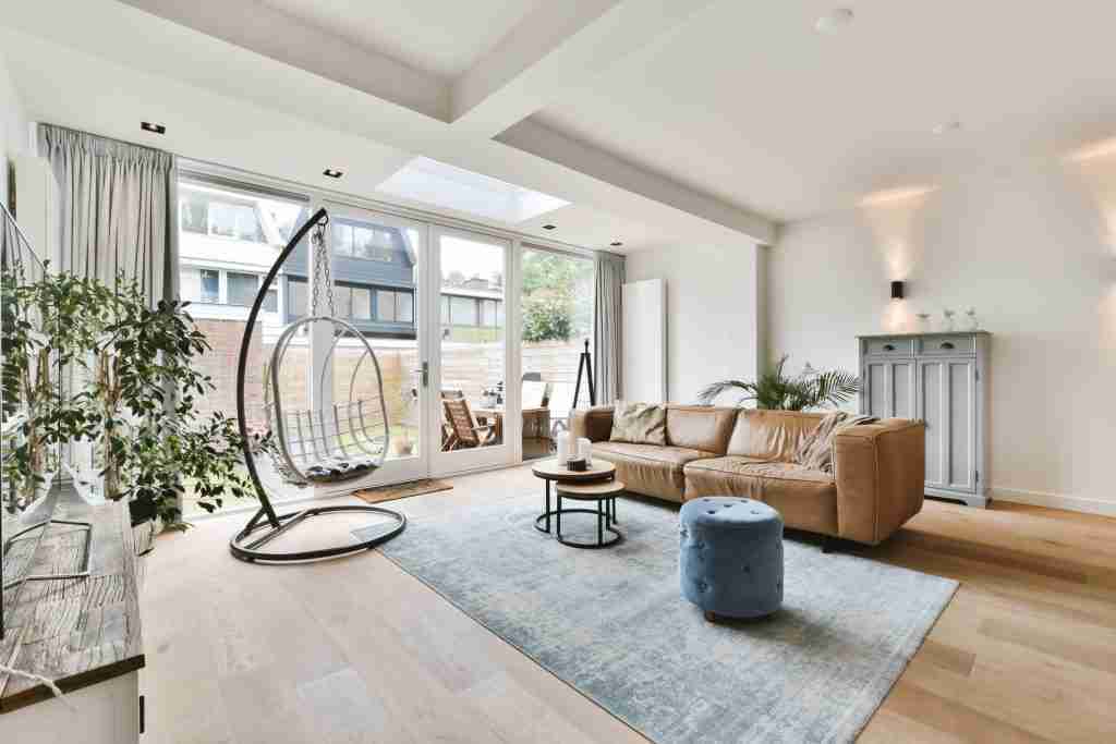 A lovely living room with a brown sofa Condo Renovation Consultation in Toronto - 9