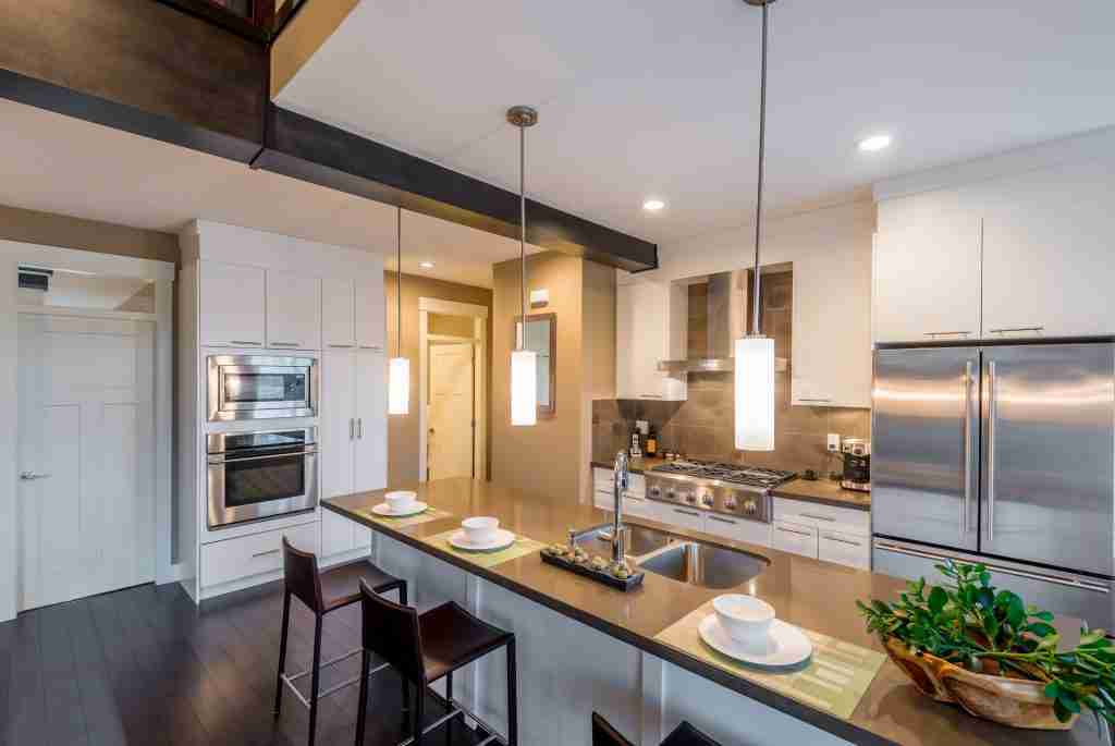 Modern, bright, clean, kitchen interior with stainless steel app Condo Renovation Contractor in Toronto - 14
