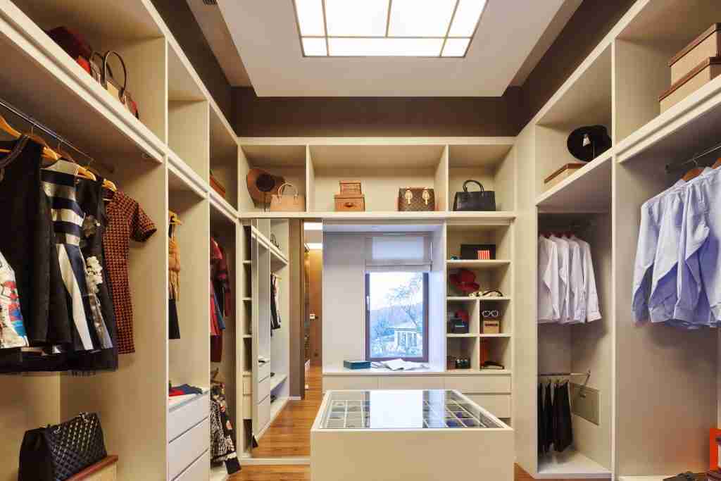 interior of modern wardrobe Custom Condo Cabinetry Services in Toronto - 9